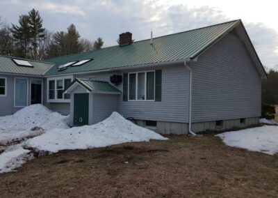 This is an exterior painting project in Goodwin Mills Limington Me