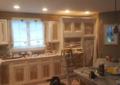 This is a cabinet painting project in Biddeford ME